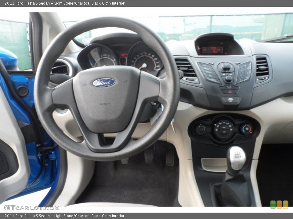 Light Stone/Charcoal Black Cloth Interior Dashboard for the 2011 Ford Fiesta S Sedan #60130962
