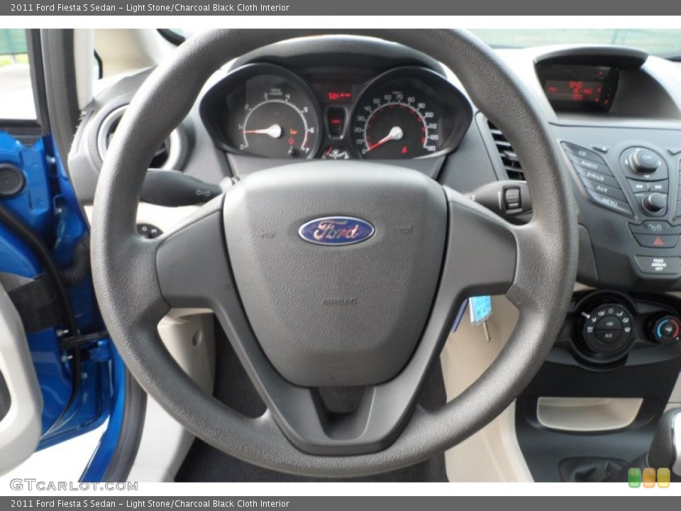 Light Stone/Charcoal Black Cloth Interior Steering Wheel for the 2011 Ford Fiesta S Sedan #60130996