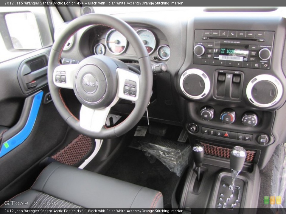 Black with Polar White Accents/Orange Stitching Interior Dashboard for the 2012 Jeep Wrangler Sahara Arctic Edition 4x4 #60141906