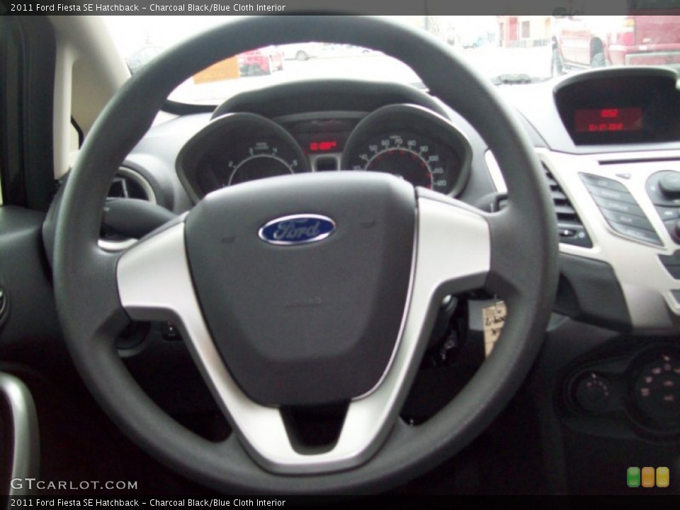 Charcoal Black/Blue Cloth Interior Steering Wheel for the 2011 Ford Fiesta SE Hatchback #60243428