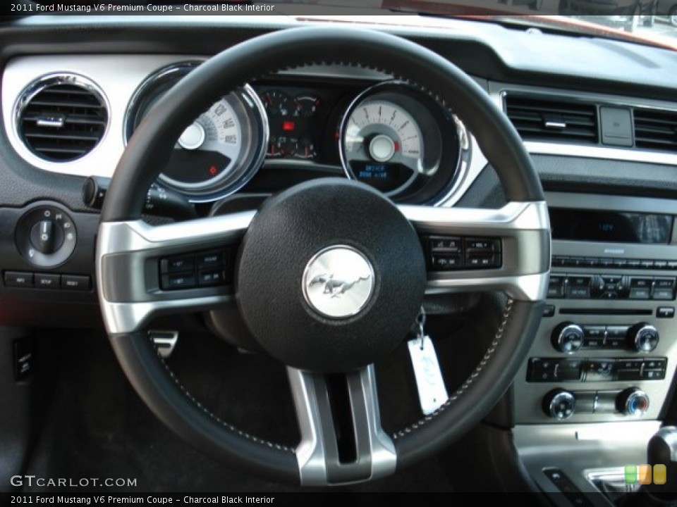 Charcoal Black Interior Steering Wheel for the 2011 Ford Mustang V6 Premium Coupe #60363720