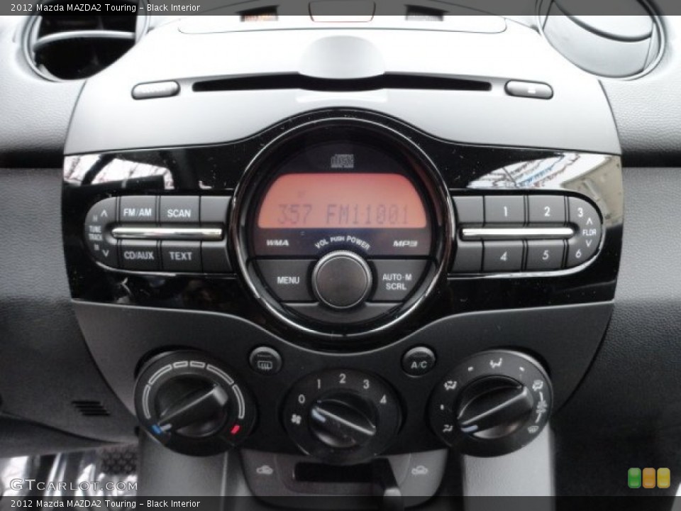Black Interior Controls for the 2012 Mazda MAZDA2 Touring #60385711