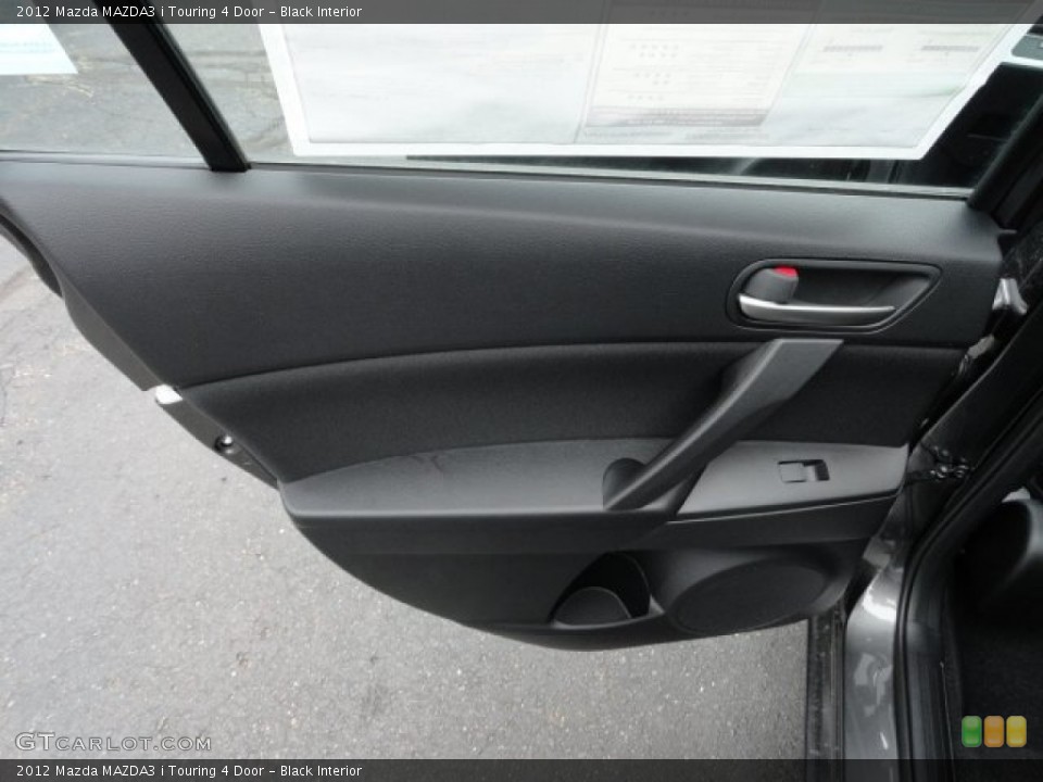 Black Interior Door Panel for the 2012 Mazda MAZDA3 i Touring 4 Door #60385834
