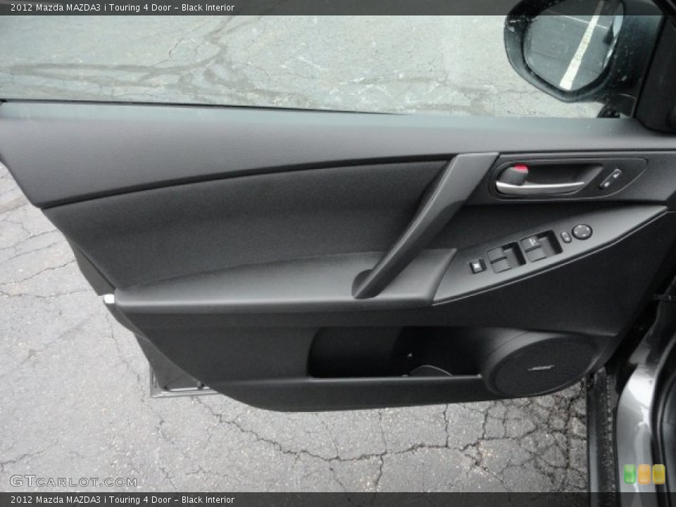Black Interior Door Panel for the 2012 Mazda MAZDA3 i Touring 4 Door #60385844