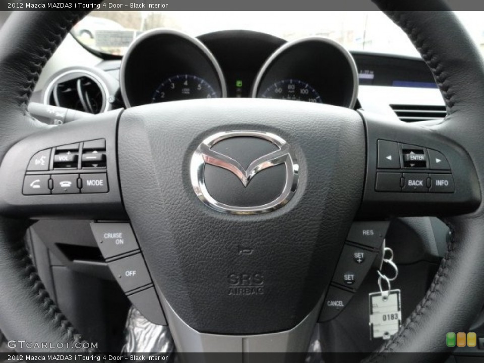 Black Interior Steering Wheel for the 2012 Mazda MAZDA3 i Touring 4 Door #60385879