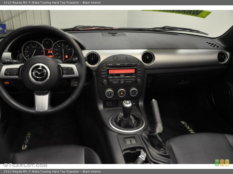 Black Interior Dashboard for the 2010 Mazda MX-5 Miata Touring Hard Top Roadster #60594762