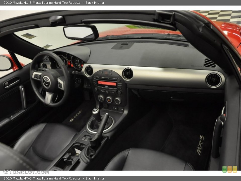 Black Interior Dashboard for the 2010 Mazda MX-5 Miata Touring Hard Top Roadster #60594906