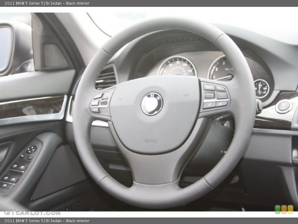 Black Interior Steering Wheel for the 2011 BMW 5 Series 528i Sedan #60678278