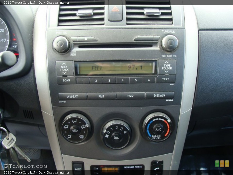 Dark Charcoal Interior Controls for the 2010 Toyota Corolla S #60724891