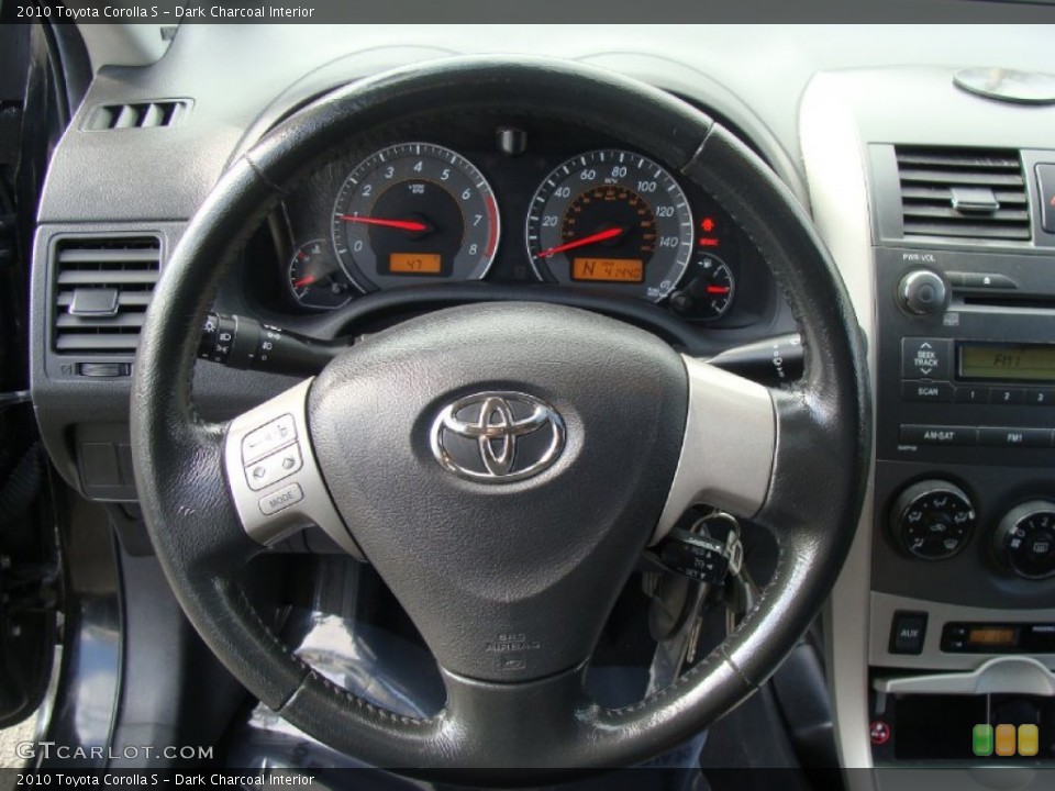 Dark Charcoal Interior Steering Wheel for the 2010 Toyota Corolla S #60724908