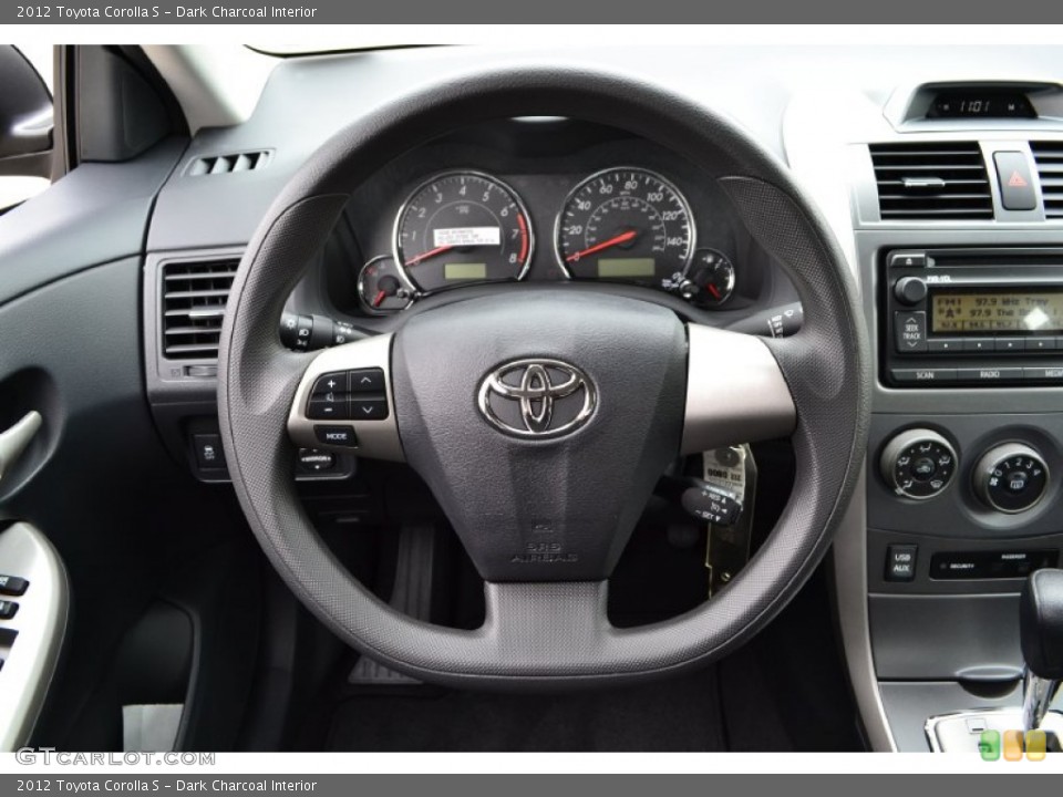 Dark Charcoal Interior Steering Wheel for the 2012 Toyota Corolla S #60727628