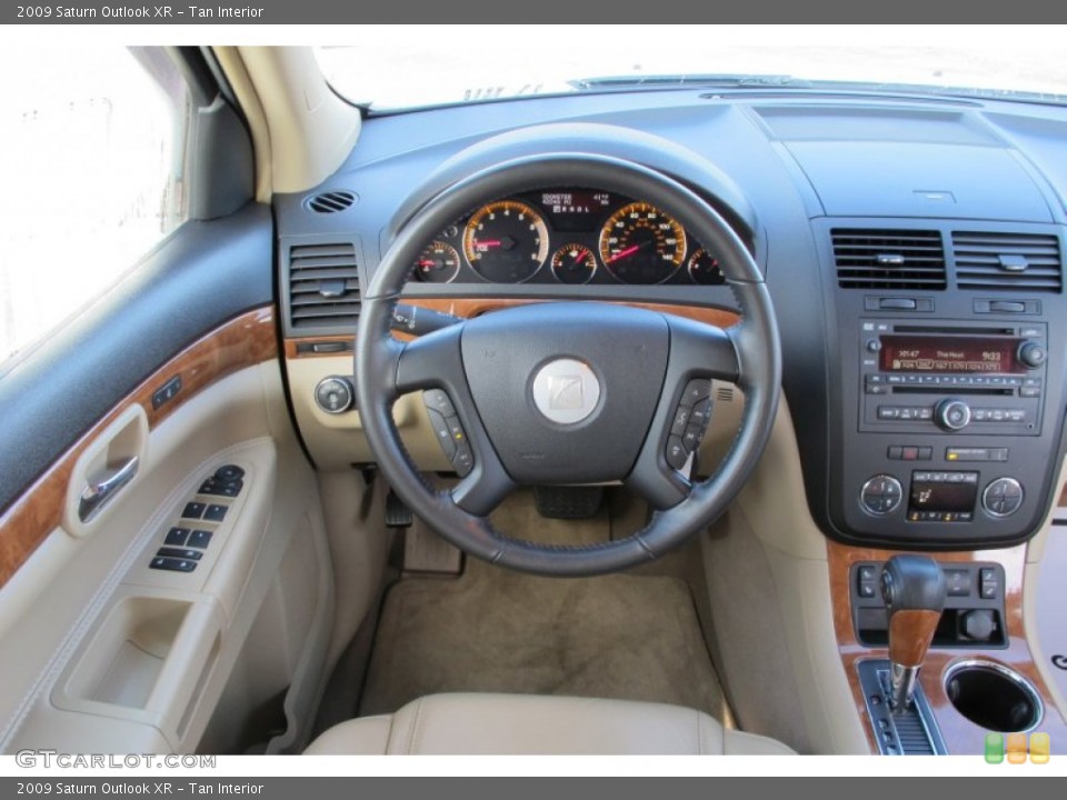 Tan Interior Dashboard for the 2009 Saturn Outlook XR #60738147