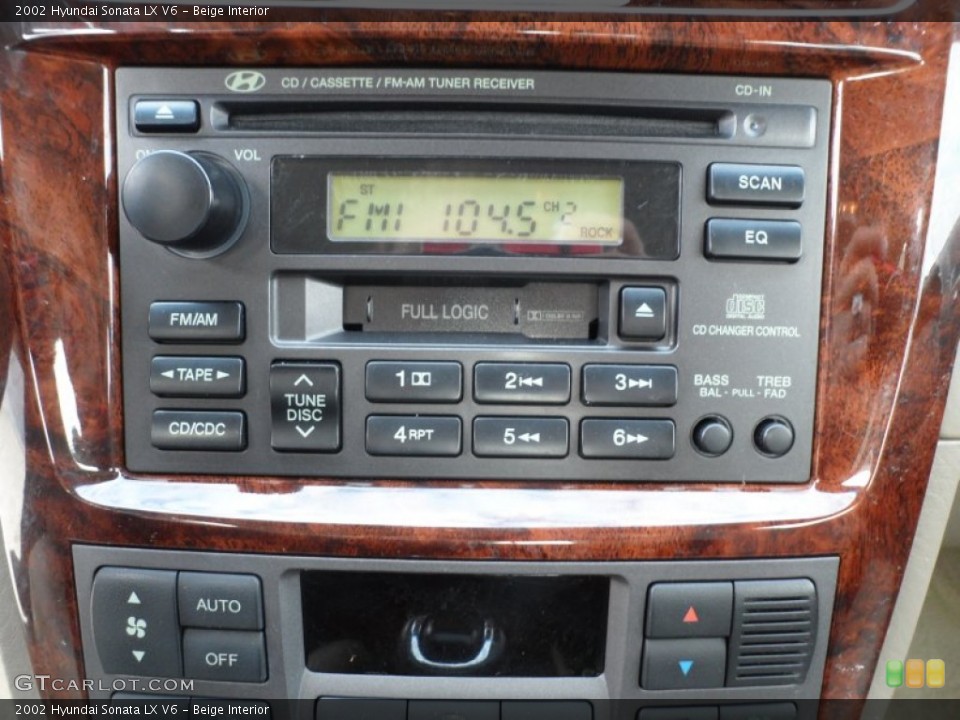 Beige Interior Audio System for the 2002 Hyundai Sonata LX V6 #60746828