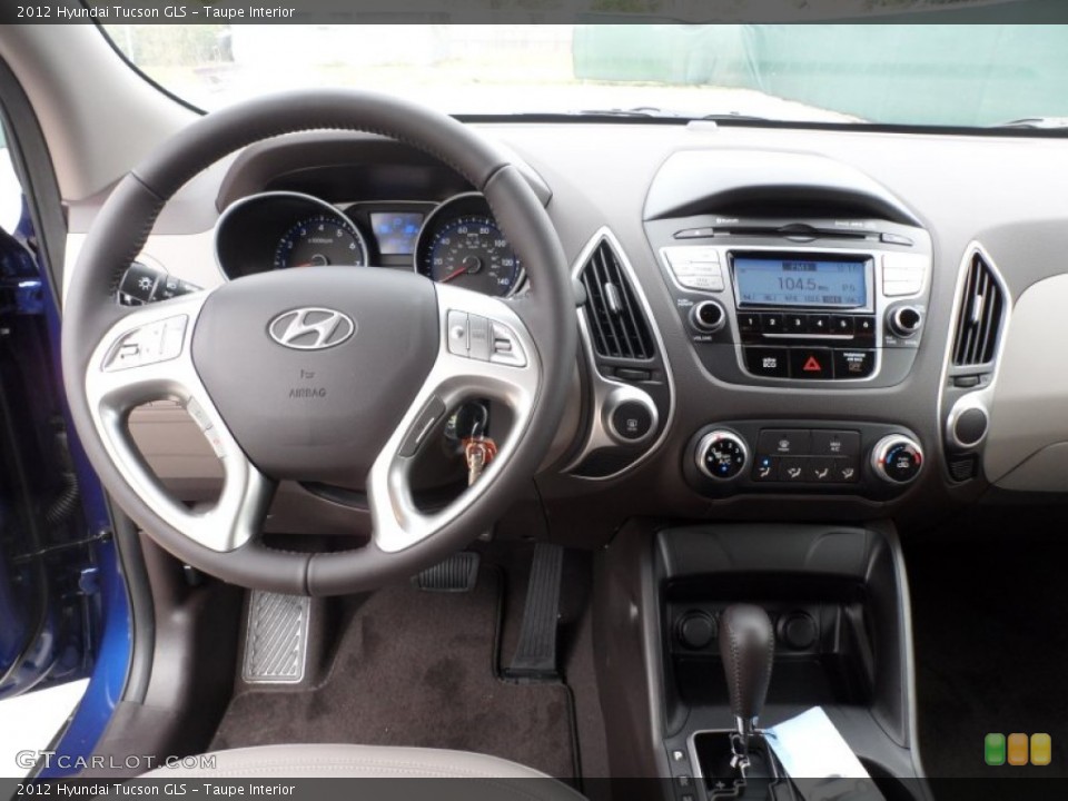 Taupe Interior Dashboard for the 2012 Hyundai Tucson GLS #60747425