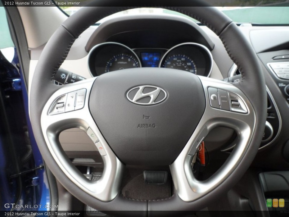 Taupe Interior Steering Wheel for the 2012 Hyundai Tucson GLS #60747476