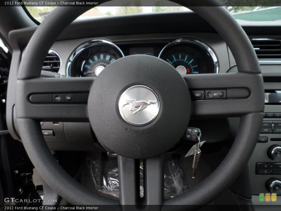 Charcoal Black Interior Steering Wheel for the 2012 Ford Mustang GT Coupe #60751656