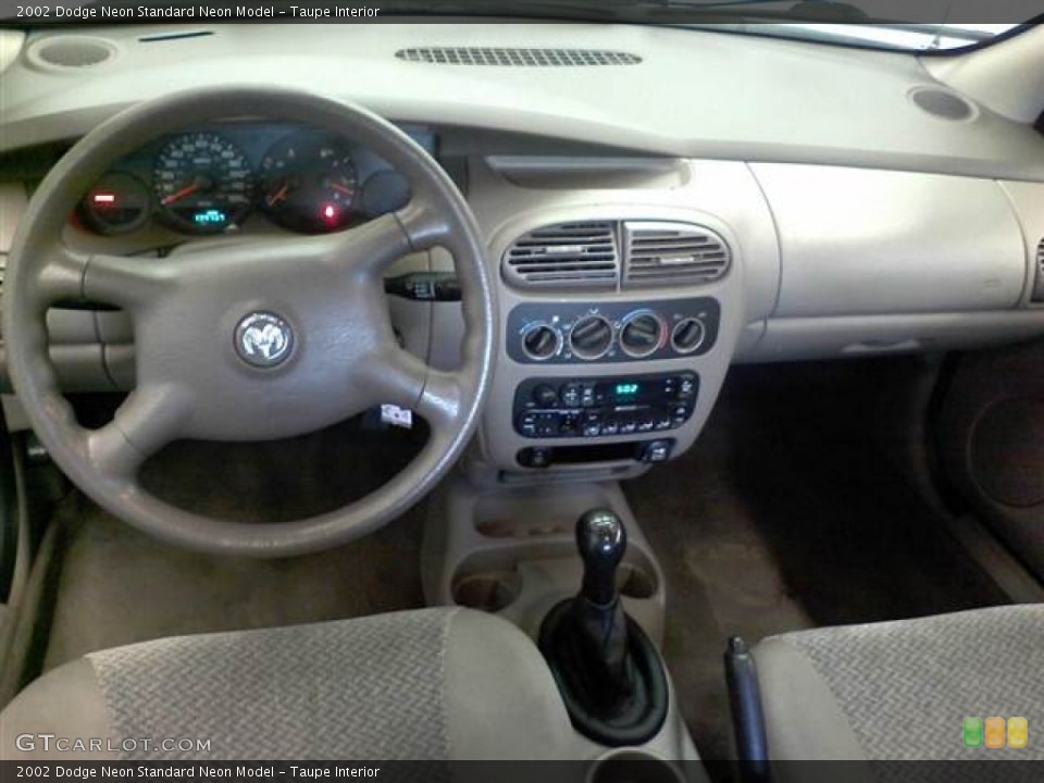 Taupe Interior Dashboard for the 2002 Dodge Neon  #60771357
