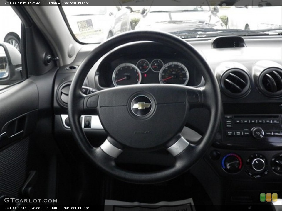 Charcoal Interior Steering Wheel for the 2010 Chevrolet Aveo LT Sedan #60777533