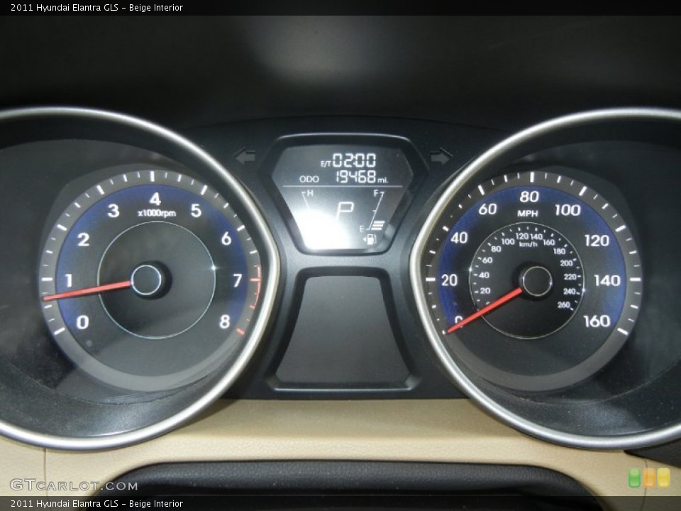 Beige Interior Gauges for the 2011 Hyundai Elantra GLS #60825754