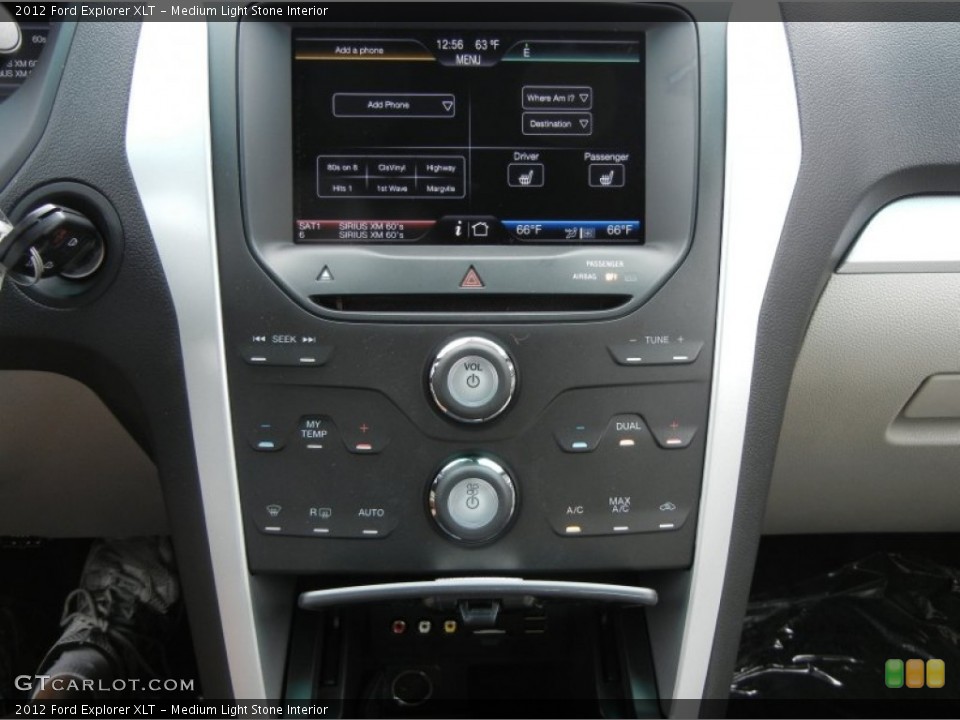 Medium Light Stone Interior Controls for the 2012 Ford Explorer XLT #60881889