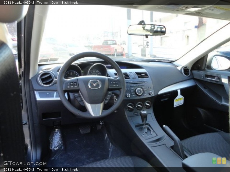 Black Interior Dashboard for the 2012 Mazda MAZDA3 i Touring 4 Door #60886539