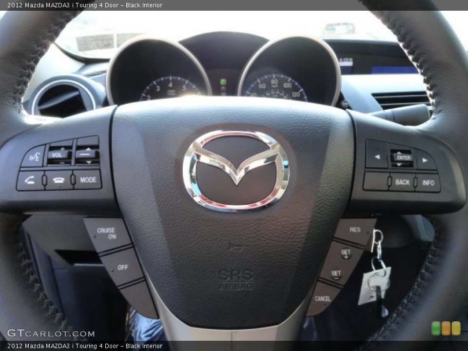 Black Interior Steering Wheel for the 2012 Mazda MAZDA3 i Touring 4 Door #60886593