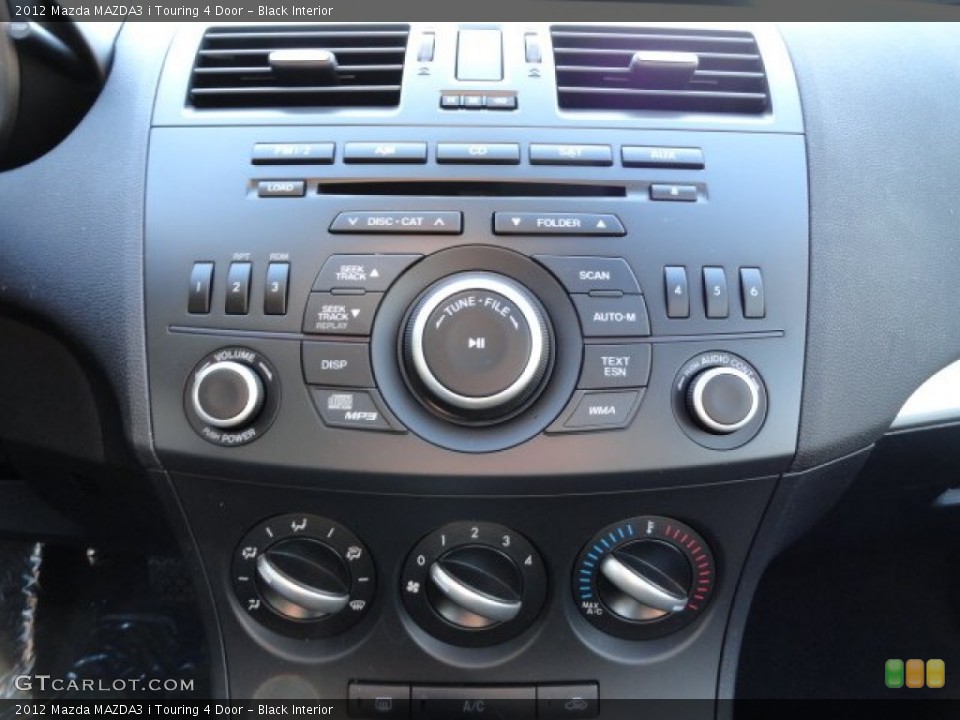 Black Interior Controls for the 2012 Mazda MAZDA3 i Touring 4 Door #60886599