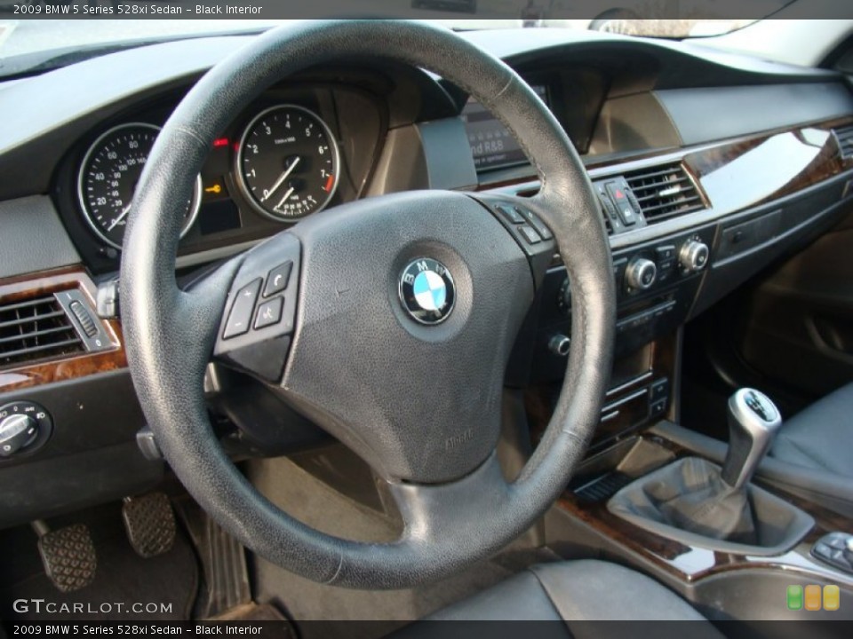 Black Interior Steering Wheel for the 2009 BMW 5 Series 528xi Sedan #60889996