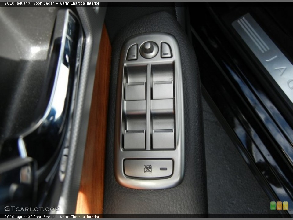 Warm Charcoal Interior Controls for the 2010 Jaguar XF Sport Sedan #60952170