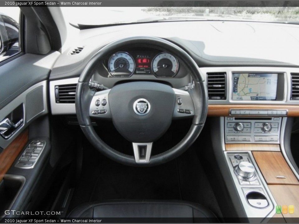 Warm Charcoal Interior Dashboard for the 2010 Jaguar XF Sport Sedan #60952236