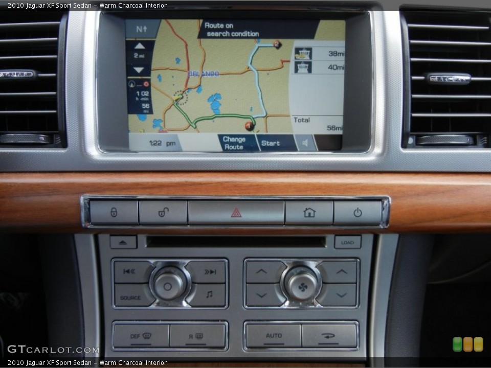 Warm Charcoal Interior Navigation for the 2010 Jaguar XF Sport Sedan #60952257