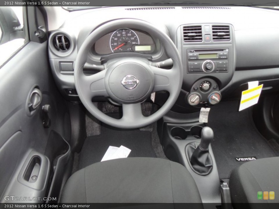 Charcoal Interior Dashboard for the 2012 Nissan Versa 1.6 S Sedan #60956478