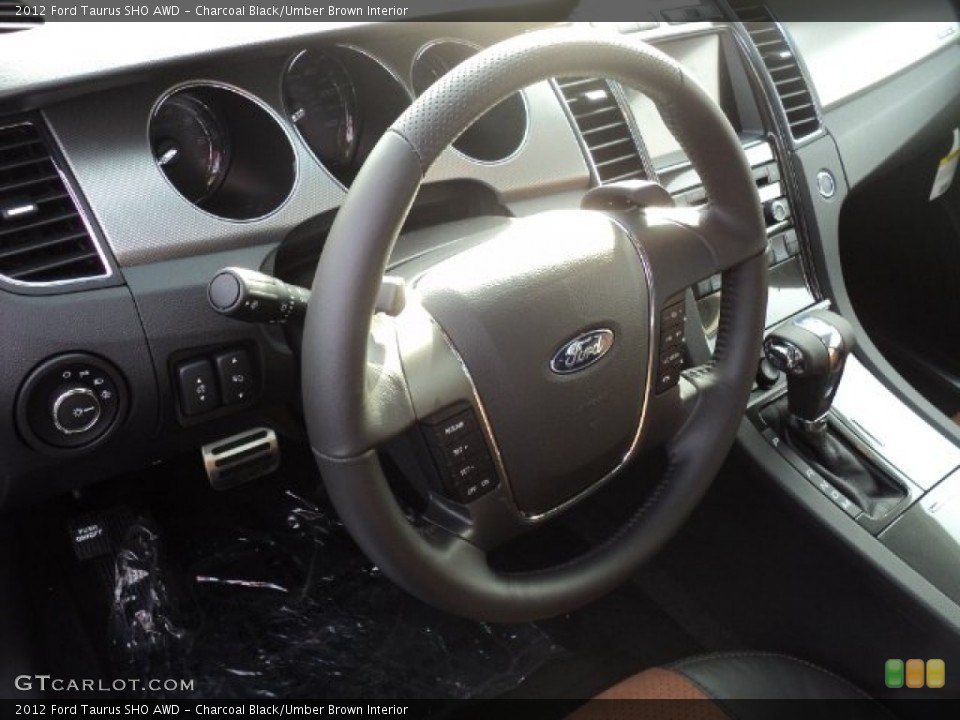 Charcoal Black/Umber Brown Interior Steering Wheel for the 2012 Ford Taurus SHO AWD #60975475