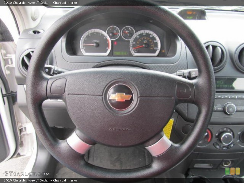 Charcoal Interior Steering Wheel for the 2010 Chevrolet Aveo LT Sedan #60983182