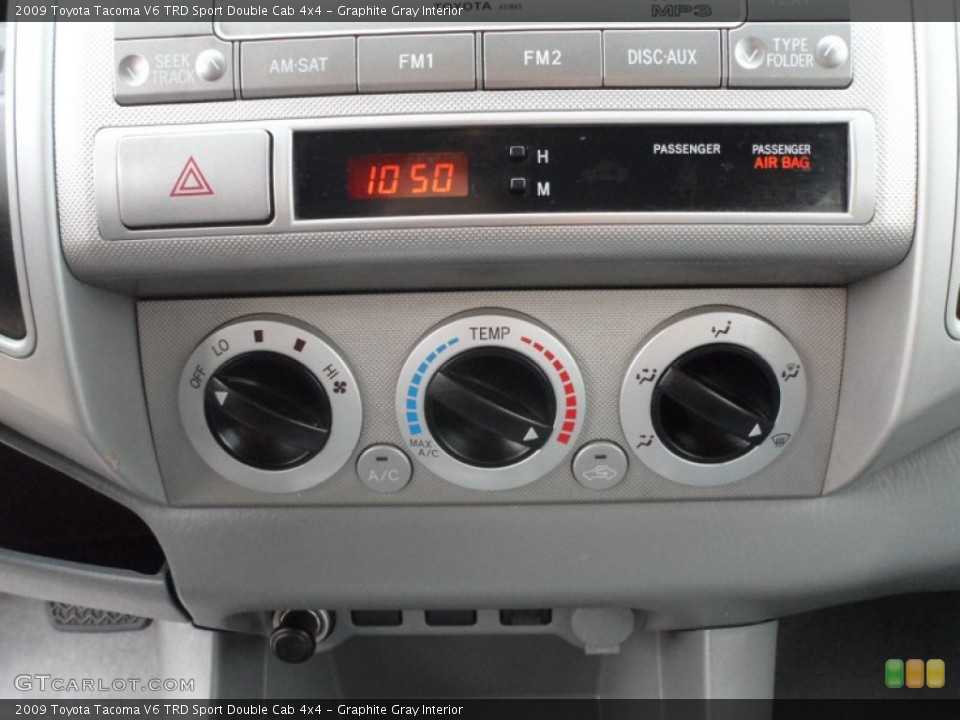 Graphite Gray Interior Controls for the 2009 Toyota Tacoma V6 TRD Sport Double Cab 4x4 #61014739