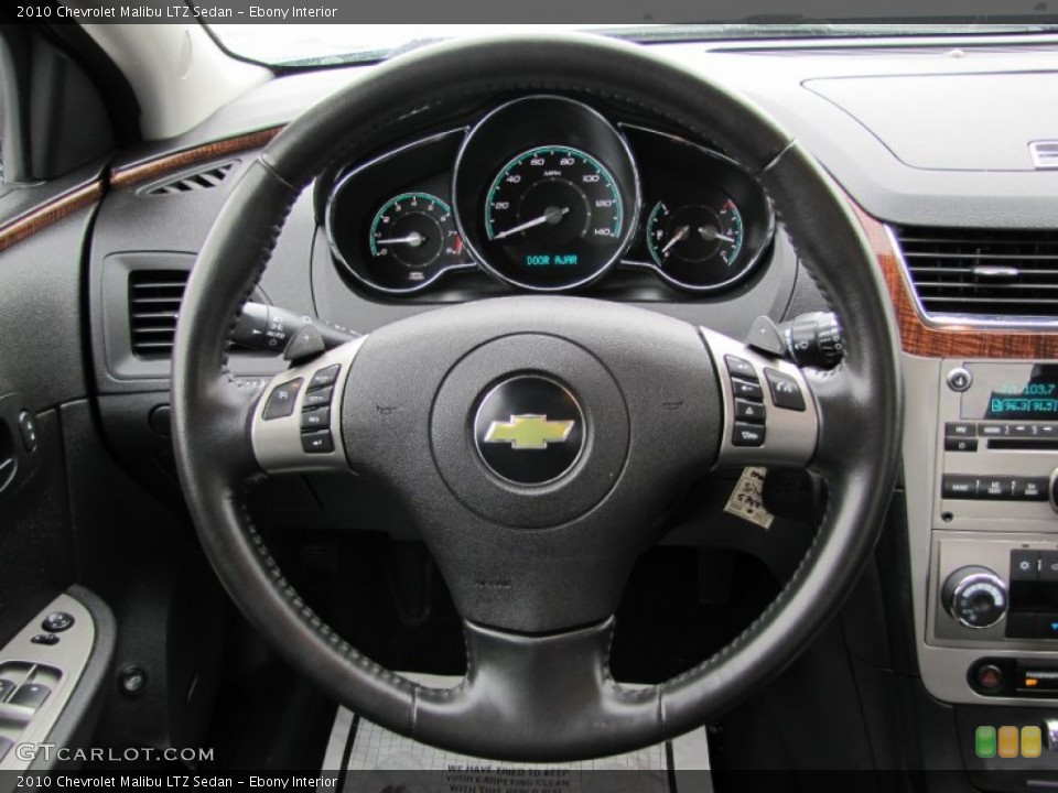 Ebony Interior Steering Wheel for the 2010 Chevrolet Malibu LTZ Sedan #61031776