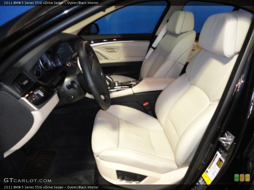 Oyster/Black Interior Photo for the 2011 BMW 5 Series 550i xDrive Sedan #61057372