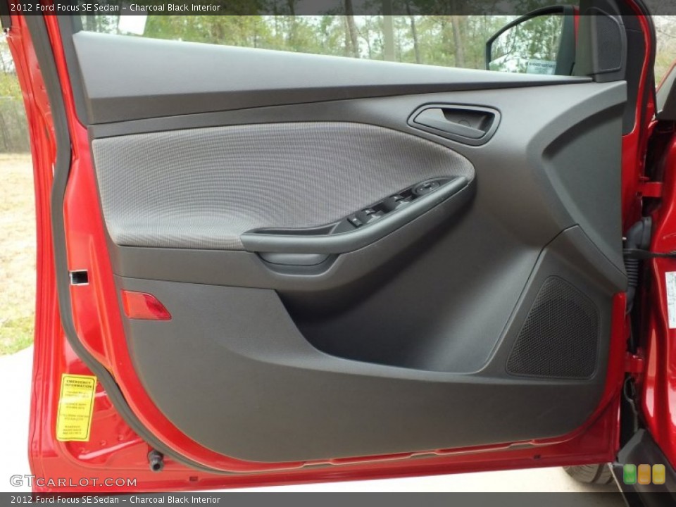 Charcoal Black Interior Door Panel for the 2012 Ford Focus SE Sedan #61121429