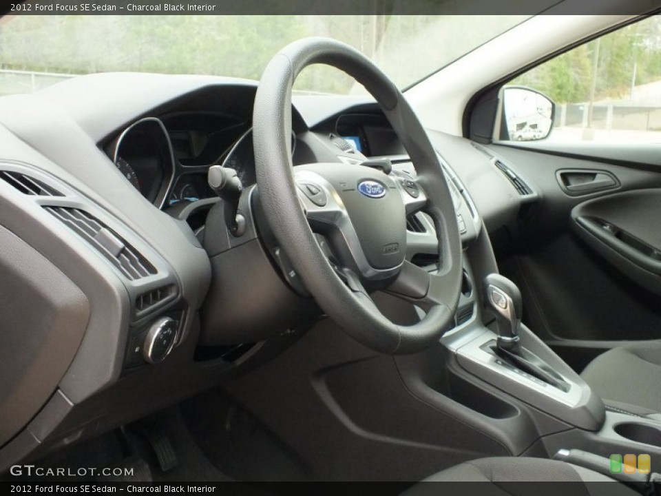 Charcoal Black Interior Steering Wheel for the 2012 Ford Focus SE Sedan #61121501