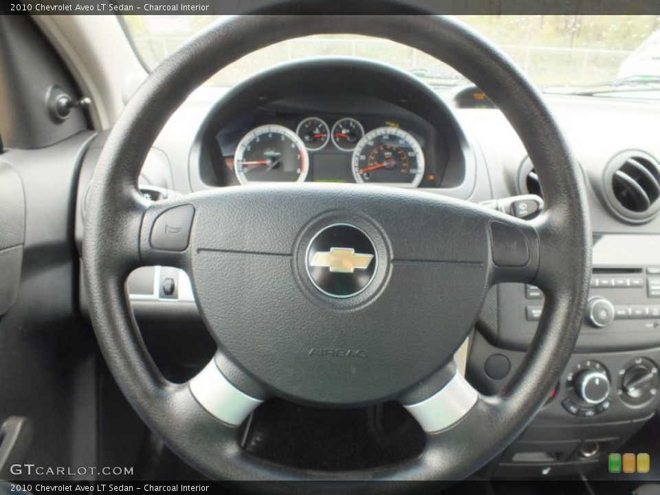 Charcoal Interior Steering Wheel for the 2010 Chevrolet Aveo LT Sedan #61123808
