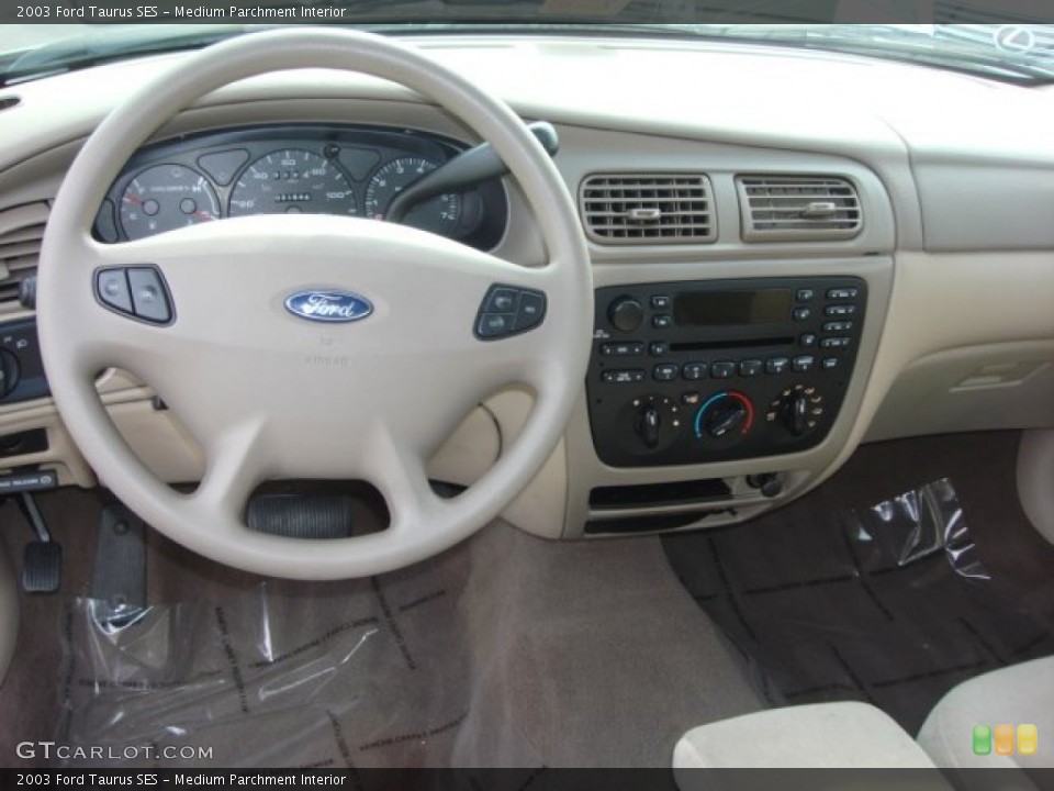 Medium Parchment Interior Dashboard for the 2003 Ford Taurus SES #61171645