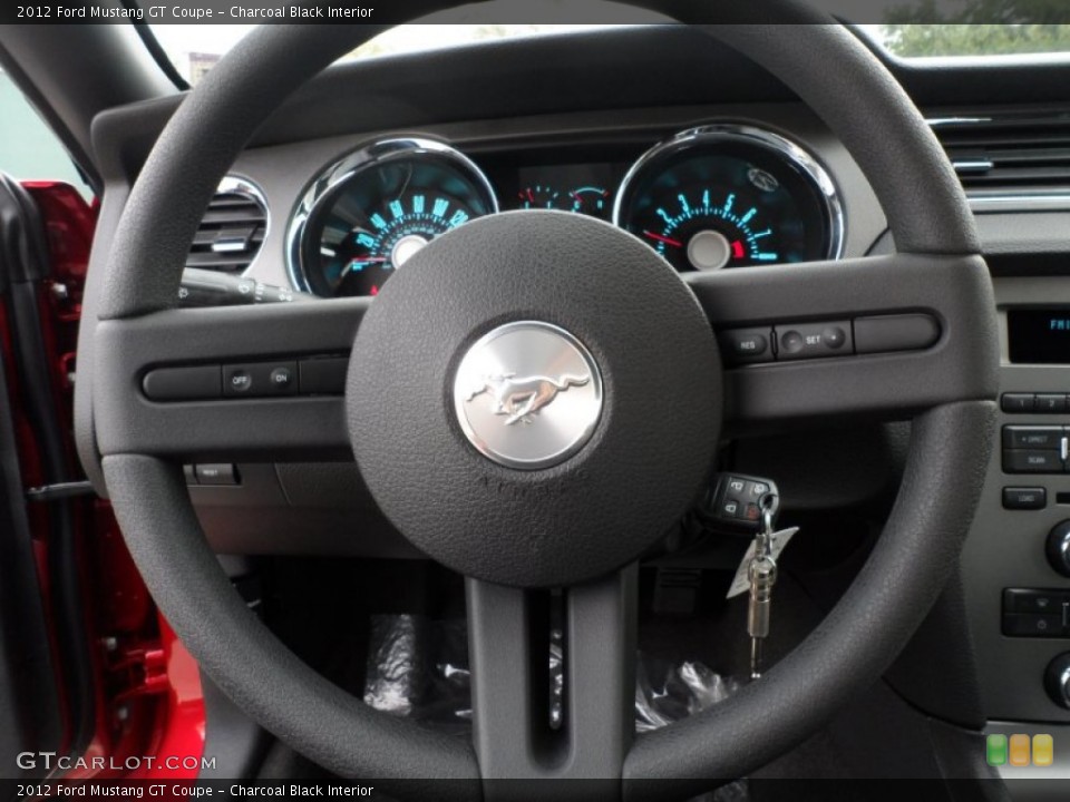Charcoal Black Interior Steering Wheel for the 2012 Ford Mustang GT Coupe #61184534