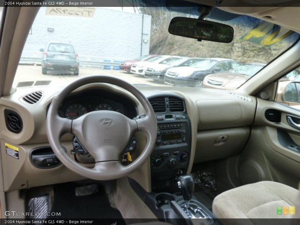 Beige Interior Dashboard for the 2004 Hyundai Santa Fe GLS 4WD #61223170