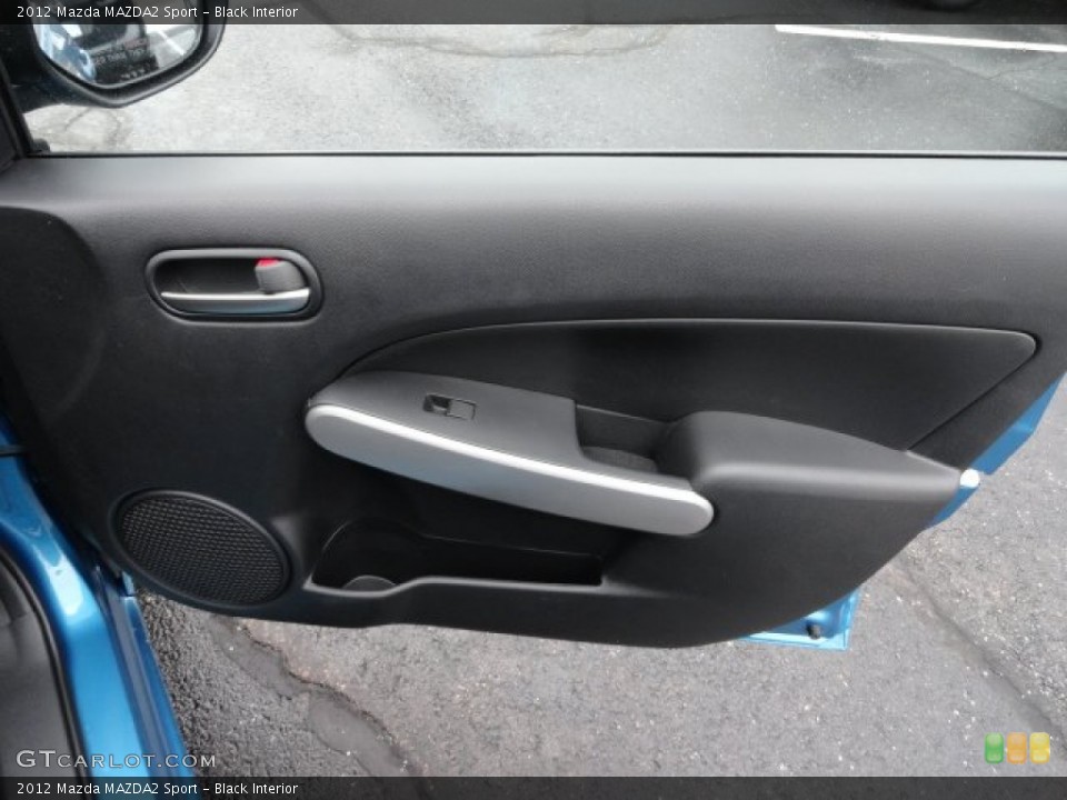 Black Interior Door Panel for the 2012 Mazda MAZDA2 Sport #61226659