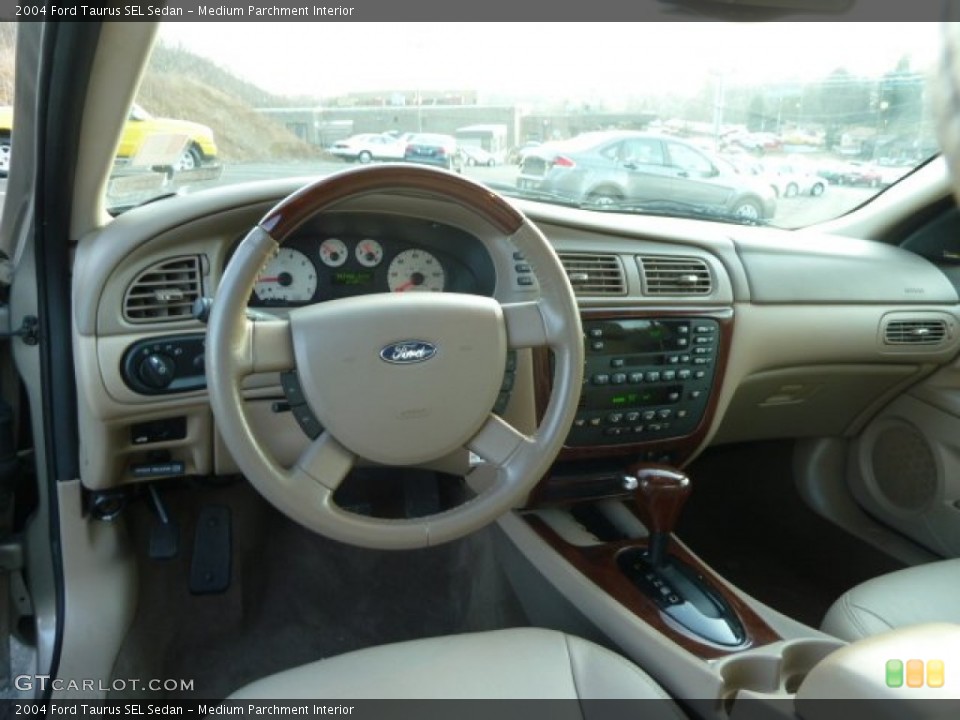 Medium Parchment Interior Dashboard for the 2004 Ford Taurus SEL Sedan #61232572