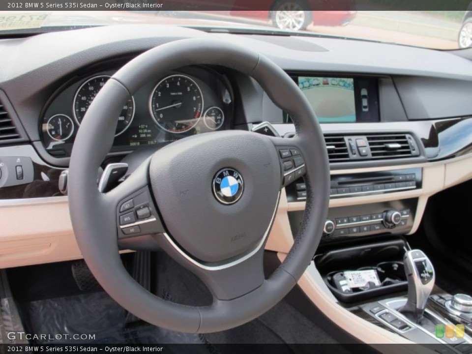 Oyster/Black Interior Steering Wheel for the 2012 BMW 5 Series 535i Sedan #61266074