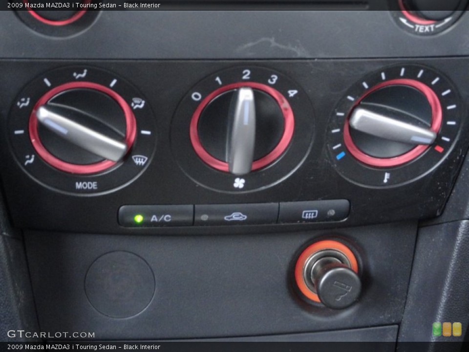 Black Interior Controls for the 2009 Mazda MAZDA3 i Touring Sedan #61275242