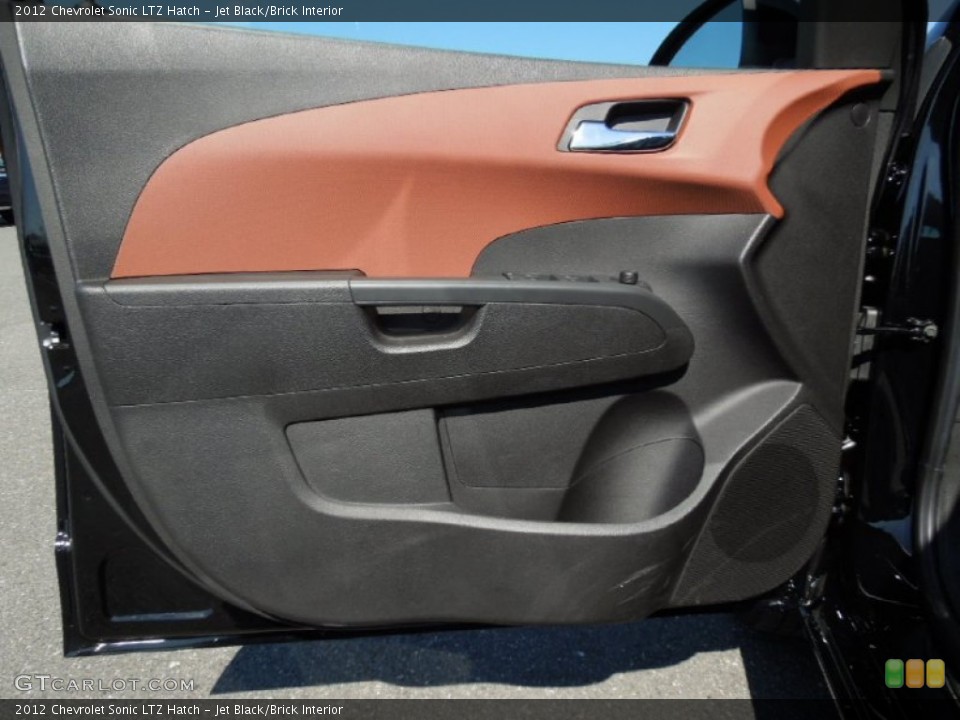 Jet Black/Brick Interior Door Panel for the 2012 Chevrolet Sonic LTZ Hatch #61279715