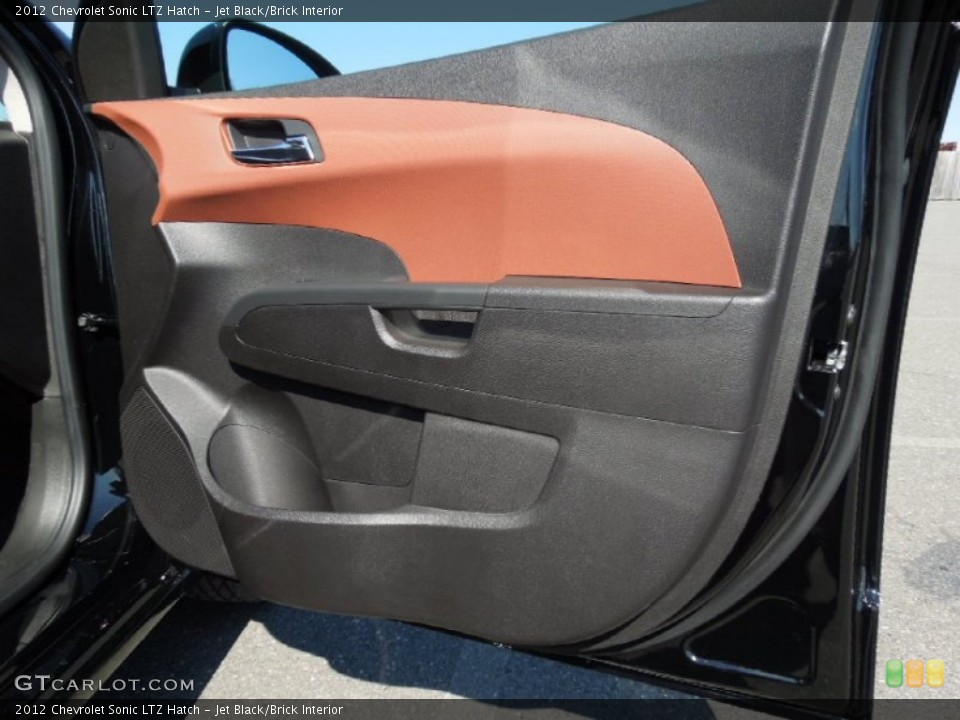 Jet Black/Brick Interior Door Panel for the 2012 Chevrolet Sonic LTZ Hatch #61279844