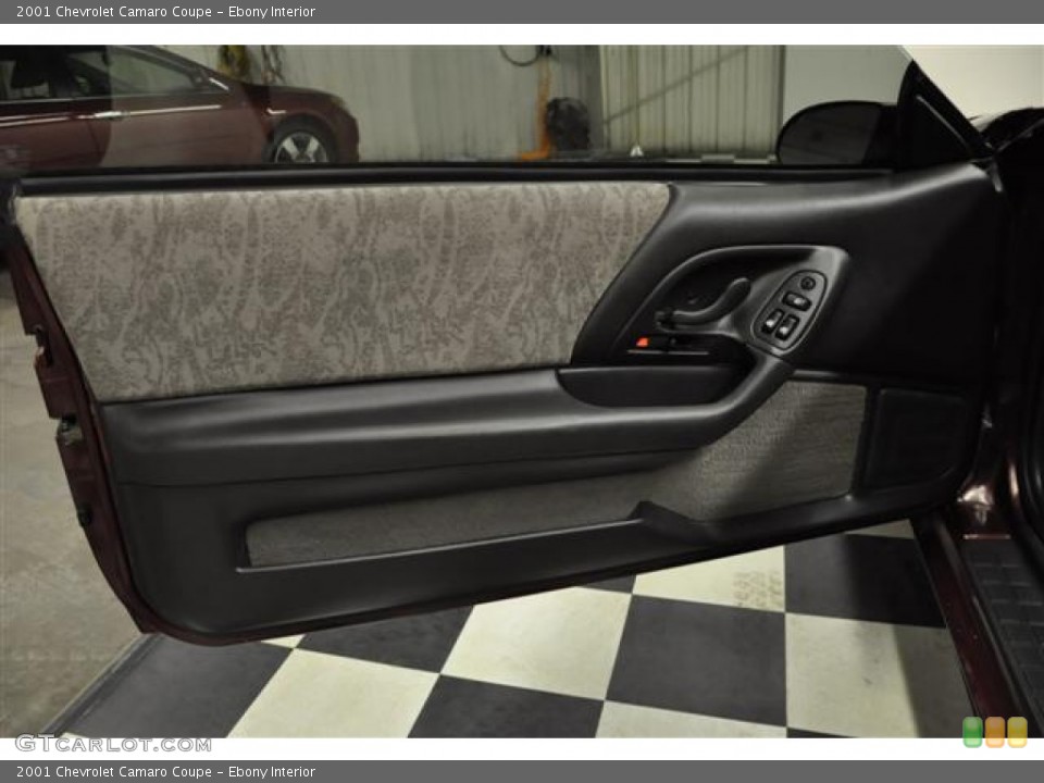 Ebony Interior Door Panel for the 2001 Chevrolet Camaro Coupe #61305515